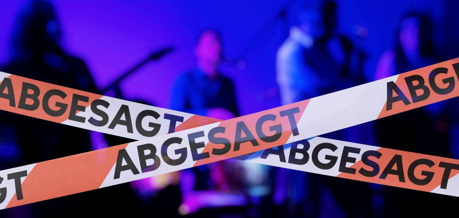 Concert,Cancelled,,Barrier,Tape,With,The,German,Word,"abgesagt",(cancelled)