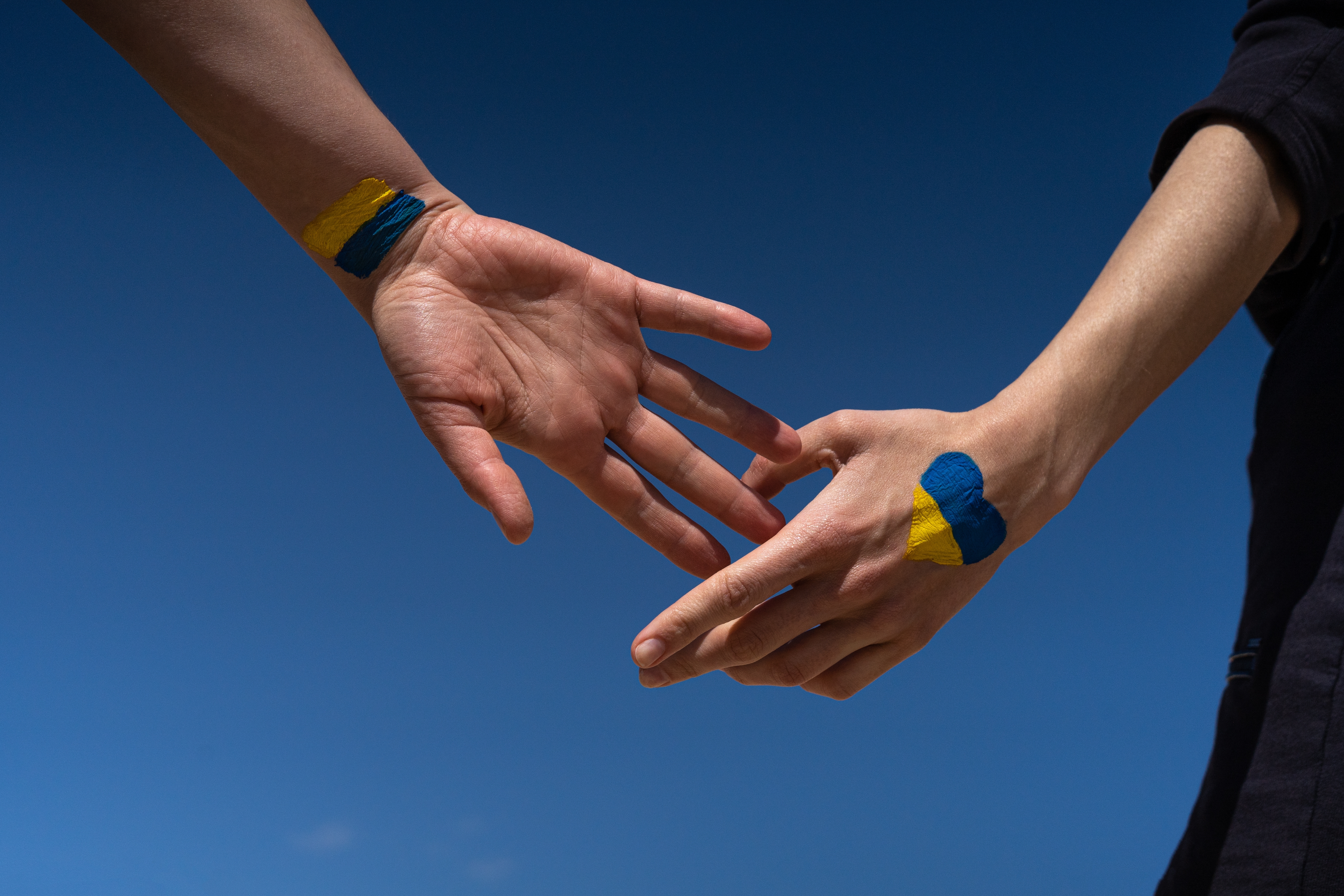 Female,Hands,Painted,In,Ukraine,Flag,Colors,Yellow-blue.,Stop,The Female,Hands,Painted,In,Ukraine,Flag,Colors,Yellow-blue.,Stop,The