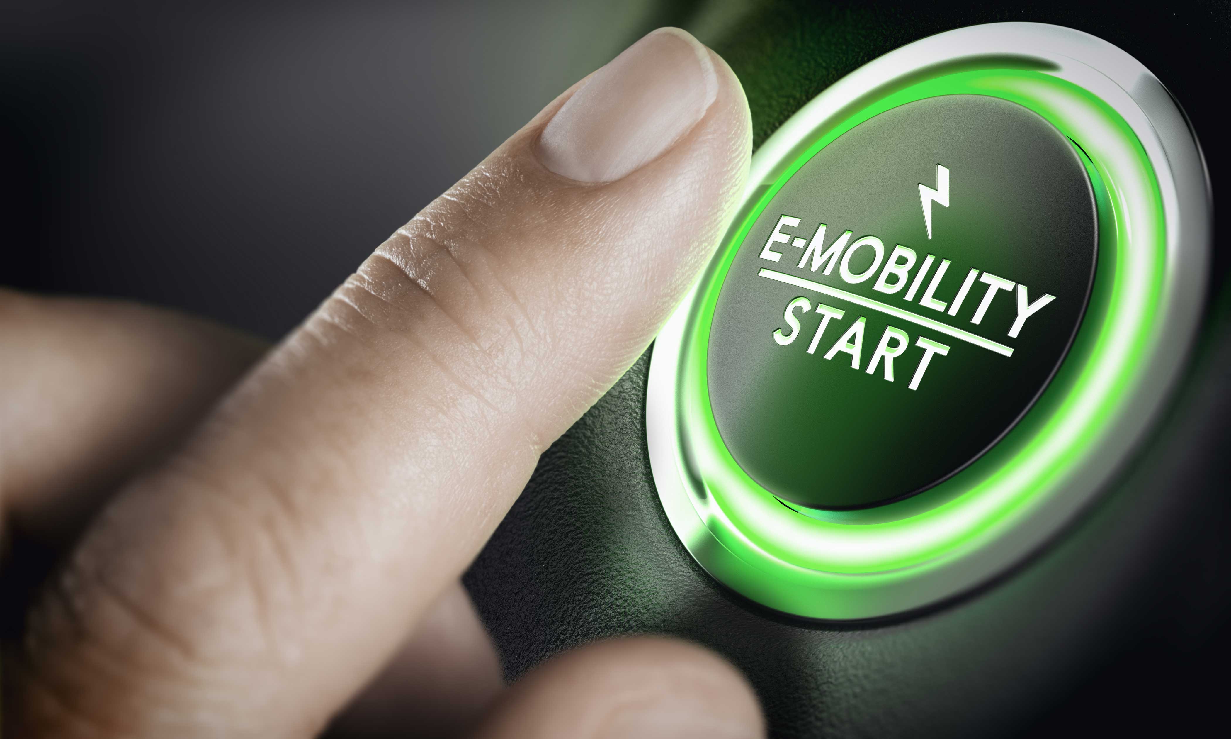 Man,Pushing,Green,Car,Button.,Concept,Of,E-mobility.,Composite,Image Man,Pushing,Green,Car,Button.,Concept,Of,E-mobility.,Composite,Image