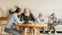 Elderly,Man,And,Woman,Sitting,At,Table,And,Enjoying,Joyful Elderly,Man,And,Woman,Sitting,At,Table,And,Enjoying,Joyful