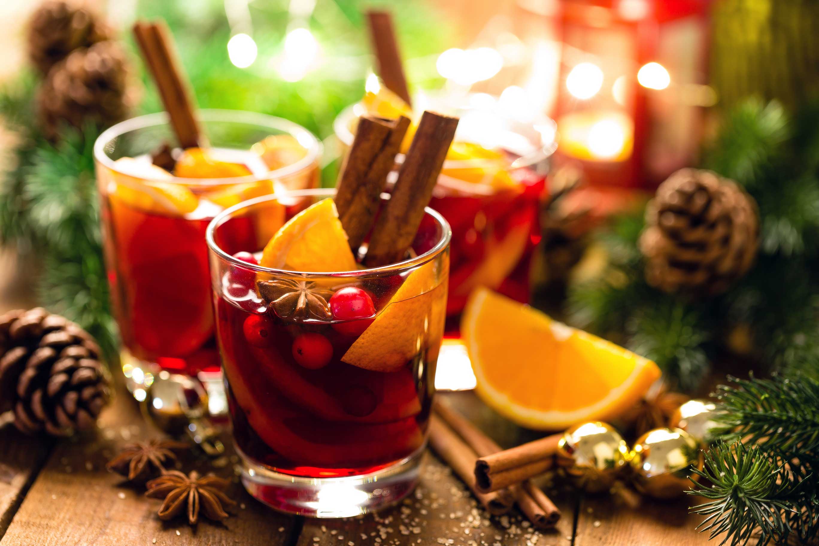 Christmas,Mulled,Red,Wine,With,Spices,And,Oranges,On,A Christmas,Mulled,Red,Wine,With,Spices,And,Oranges,On,A