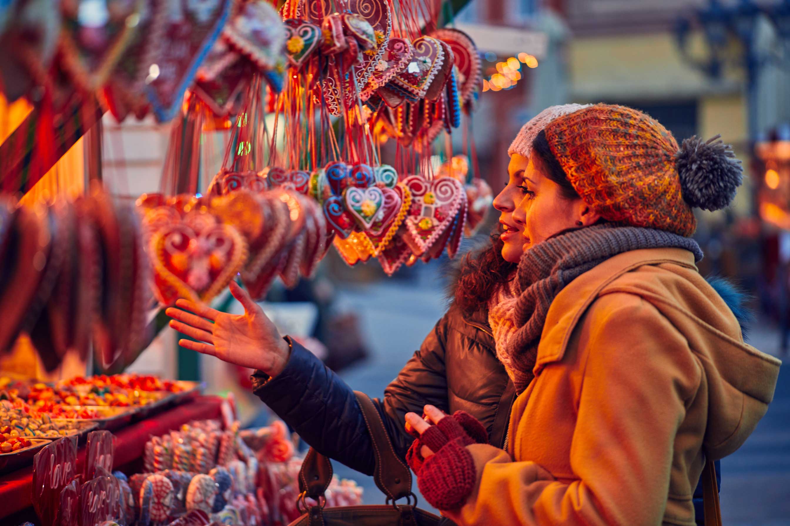 Friends,Buying,Candies,On,Christmas,Market